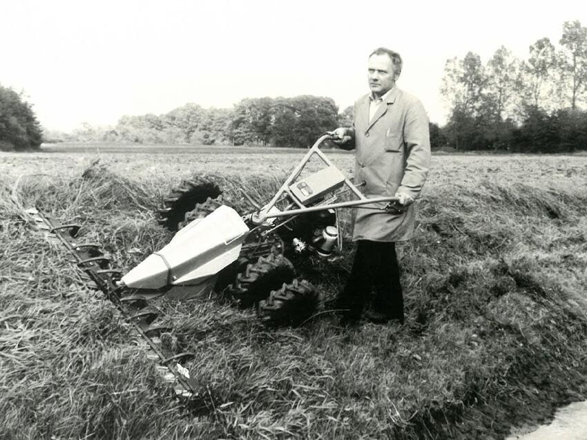 Historie Handmähmaschine